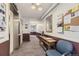 Building common area with seating and notice board at 3184 S Heather Gardens Way # 302, Aurora, CO 80014
