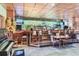 Community bar with seating and a piano at 3184 S Heather Gardens Way # 302, Aurora, CO 80014