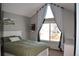 Bright bedroom with a large window and view of backyard at 5411 E Courtney Ave, Castle Rock, CO 80104