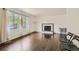 Living room with hardwood floors and a fireplace at 606 Elkhart St, Aurora, CO 80011