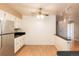 Bright kitchen with stainless steel appliances and hardwood floors at 6851 S Franklin St, Centennial, CO 80122