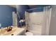 Clean bathroom with tub, shower, and updated vanity at 762 Mockingbird Ln, Brighton, CO 80601
