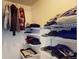 Shelved closet with hanging rods and ample storage space at 762 Mockingbird Ln, Brighton, CO 80601