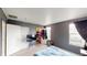 Spacious bedroom with large closet and neutral gray walls at 762 Mockingbird Ln, Brighton, CO 80601