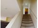 Indoor stairway leading to the upper level of the home at 762 Mockingbird Ln, Brighton, CO 80601