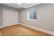 Simple bedroom with double door closet and carpet flooring at 6988 S Riverwood Way, Aurora, CO 80016