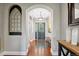 Elegant entryway with hardwood floors and decorative accents at 6988 S Riverwood Way, Aurora, CO 80016