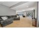 Spacious basement with sectional sofa and access to backyard at 6988 S Riverwood Way, Aurora, CO 80016