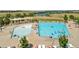 Community pool with plenty of lounge chairs at 6988 S Riverwood Way, Aurora, CO 80016