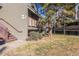 Townhouse exterior showcasing stairs and landscaping at 5300 E Cherry Creek South Dr # 905, Denver, CO 80246