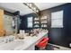 Primary bathroom with double vanity and a large mirror at 4422 E Andover Ave, Castle Rock, CO 80104