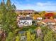 Aerial view of house with mountain views at 14390 W 48Th Ave, Golden, CO 80403