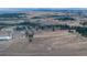 Aerial view of property with large lot and mountain views at 3074 County Road 166, Elizabeth, CO 80107