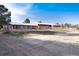 Long barn with multiple stalls and fenced area at 3074 County Road 166, Elizabeth, CO 80107