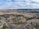 Aerial view of a large lot with a house and outbuildings at 3074 County Road 166, Elizabeth, CO 80107