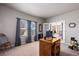 Bright home office features built-in desk and French doors at 37159 Pheasant Run, Elizabeth, CO 80107