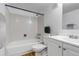 Clean bathroom with shower/tub combo, toilet and vanity with wood-look cabinetry at 2441 S Xanadu Way # D, Aurora, CO 80014