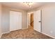 Bedroom with double door closet and neutral wall color at 7010 Utica St # E, Westminster, CO 80030