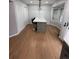 Kitchen island with white countertop and seating for two at 2131 Ranch Dr, Denver, CO 80234