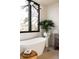 Bathroom with freestanding tub and a window at 800 Bonnie Brae Blvd, Denver, CO 80209