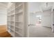 Bright bedroom with built-in shelving and city views at 1365 Columbine St # 603, Denver, CO 80206