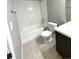 Bathroom with bathtub, toilet and sink at 1179 S Sherman St, Denver, CO 80210