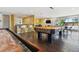 Community room with pool table, shuffleboard, and seating area at 4570 E Yale Ave # 706, Denver, CO 80222