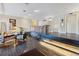 Condominium lobby with seating area, water feature, and elevators at 4570 E Yale Ave # 706, Denver, CO 80222