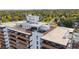 Aerial view of building showing rooftop deck at 4570 E Yale Ave # 706, Denver, CO 80222