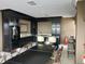 Well-equipped community kitchen with dark wood cabinets at 4570 E Yale Ave # 706, Denver, CO 80222