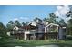 Luxury home showcasing expansive backyard and mountain views at 7499 Preservation Trl, Parker, CO 80134