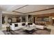 Relaxing game room with comfortable seating, a pool table, and a wet bar at 7499 Preservation Trl, Parker, CO 80134
