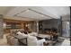 Cozy Gathering room includes a fireplace, comfortable seating, and a built-in bar at 7499 Preservation Trl, Parker, CO 80134