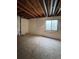 Unfinished basement with exposed beams and plumbing at 21620 E Crestline Ln, Centennial, CO 80015
