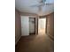 Bedroom with closet and access to another room at 21620 E Crestline Ln, Centennial, CO 80015