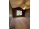 Spacious carpeted bedroom with ceiling fan and window at 21620 E Crestline Ln, Centennial, CO 80015