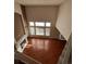 High ceiling living room with hardwood floors and fireplace at 21620 E Crestline Ln, Centennial, CO 80015