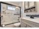 Clean bathroom featuring a shower/tub combo and updated vanity at 9030 Hickory Pl, Thornton, CO 80229