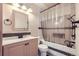 Bathroom with a tub, shower, and updated vanity at 9030 Hickory Pl, Thornton, CO 80229