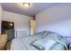 Bedroom with a double bed and neutral walls at 9030 Hickory Pl, Thornton, CO 80229