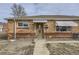 Brick ranch home with a carport and mature trees at 9030 Hickory Pl, Thornton, CO 80229