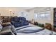 Living room with comfortable seating and hardwood floors at 9030 Hickory Pl, Thornton, CO 80229