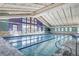 Indoor lap pool with large windows and a relaxing atmosphere at 3144 S Wheeling Way # 410, Aurora, CO 80014