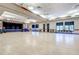 Large community room with a stage and hardwood floors at 3144 S Wheeling Way # 410, Aurora, CO 80014