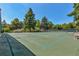 Well-maintained tennis court with seating at 3144 S Wheeling Way # 410, Aurora, CO 80014