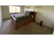 Charming bedroom with a queen-size bed and built-in drawers at 3144 S Wheeling Way # 410, Aurora, CO 80014