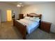 Spacious main bedroom with king-size bed and en-suite bathroom at 3144 S Wheeling Way # 410, Aurora, CO 80014