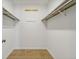 Large walk-in closet with double hanging rods and shelving at 3228 S Xanadu St, Aurora, CO 80014