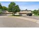 Exterior view of townhouses with attached garages and landscaping at 3228 S Xanadu St, Aurora, CO 80014