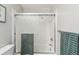 Clean bathroom with bathtub, shower, and updated fixtures at 3228 S Xanadu St, Aurora, CO 80014